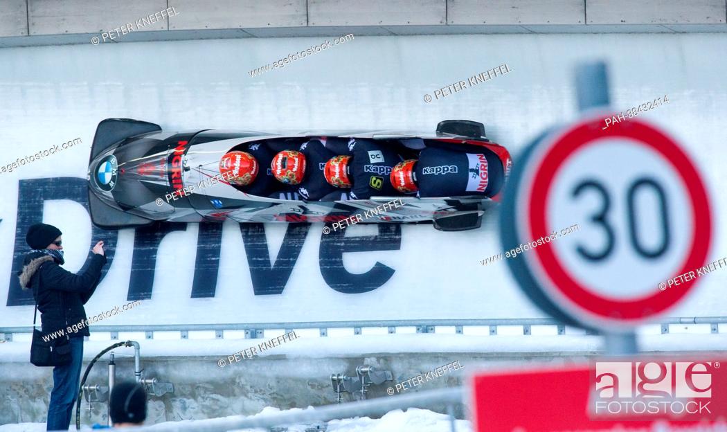 Stock Photo: Four-man bobsleigh with Benjamin Maier, Stefan Laussegger, Markus Sammer and Ion Danut Moldovan of Austria in action during the 1st run in Schoenau am.