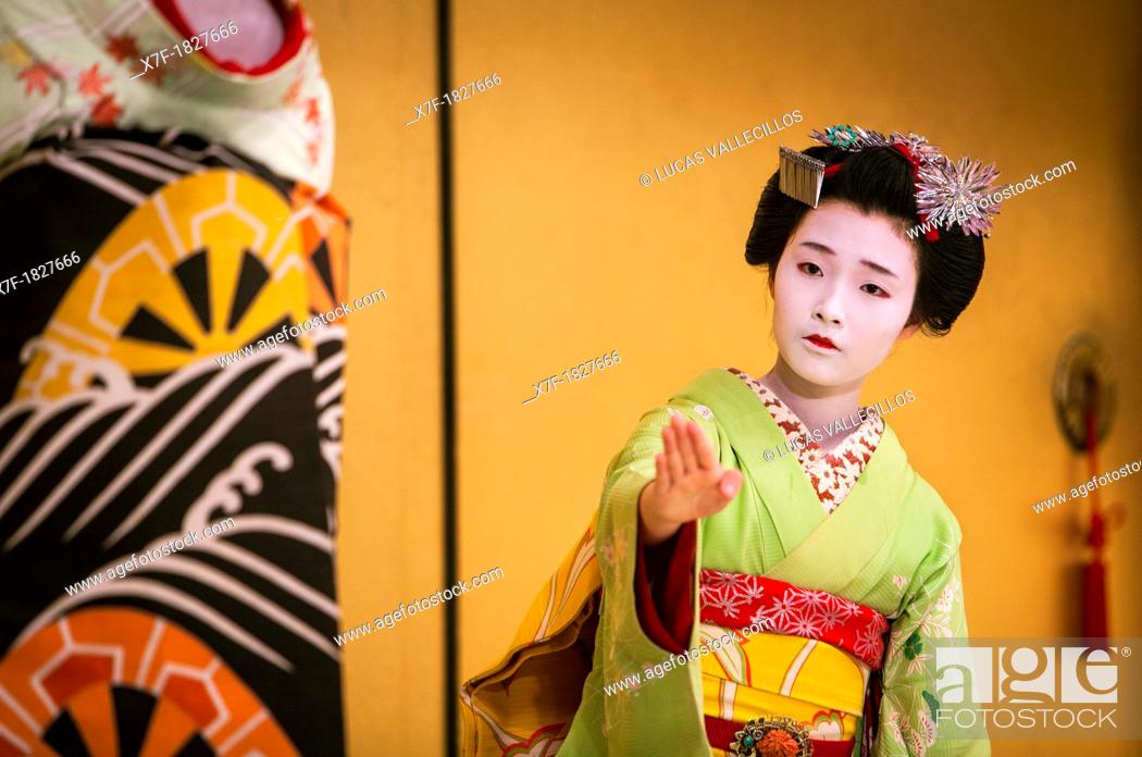 Stock Photo: Show of Maikos, geisha apprenticesthey interpret Kyomai, is a Kyoto dance, at Gion Kobu Kaburenjo, geisha's distric of Gion, , Kyoto  Kansai, Japan.
