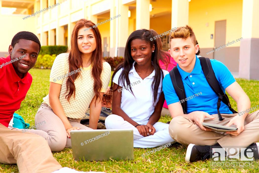 Stock Photo: High School Students Studying Outdoors On Campus.