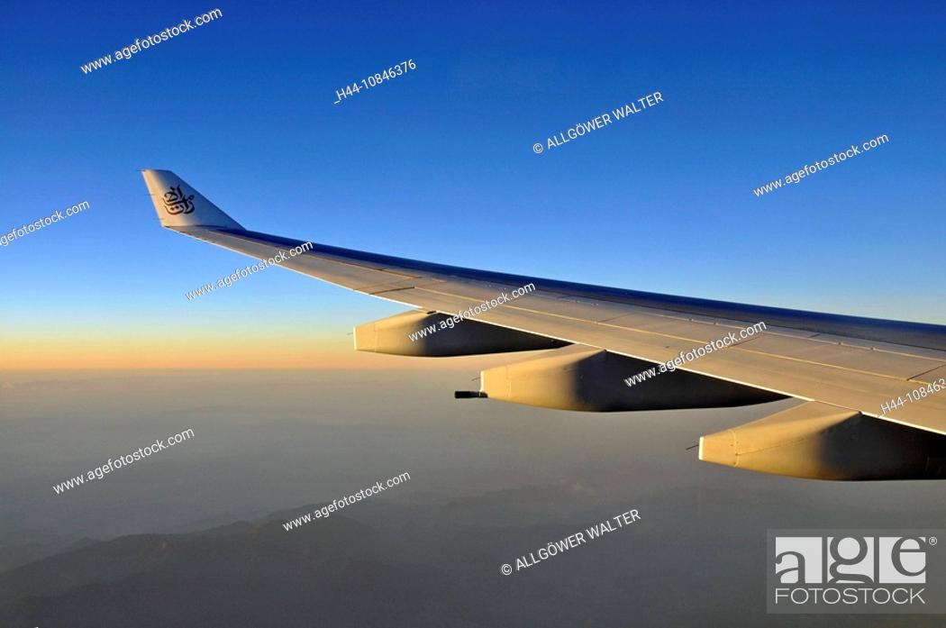 Stock Photo: Airplane wing, logo, Emirates, airplane, travel, winglet, wingtip, aviation, jet, air liner, tourism, Arabia, United A.