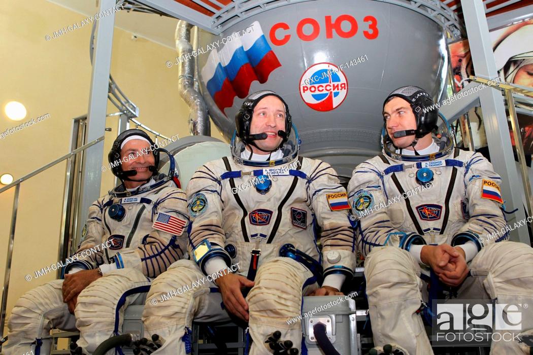 Stock Photo: At the Gagarin Cosmonaut Training Center in Star City, Russia, Expedition 49-50 backup crewmembers Mark Vande Hei of NASA (left) and Alexander Misurkin (center).