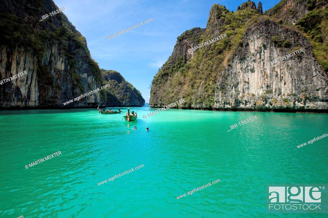 Stock Photo: Long tail boats in a secluded bay, Ko Phi Phi Iceland, Phuket Thailand, Southeast Asia, Asia.
