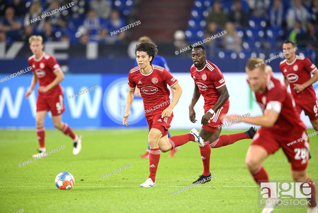 Stock Photo: Ao TANAKA (D) action, r. Khaled NAREY (D) Soccer 2nd Bundesliga, 5th matchday, FC Schalke 04 (GE) - Fortuna Dusseldorf (D) 3: 1.