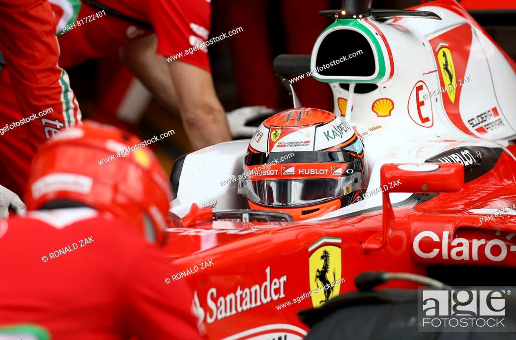 Stock Photo: Ferrari driver Kimi Raikkonen of Finland gets a pit service during the qualifying session prior to the Formula One Grand Prix, at the Red Bull Ring in Spielberg.