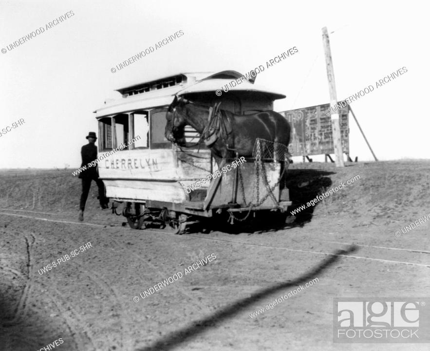 Stock Photo: Denver, Colorado: c. 1903 The Cherrelyn Horse Car Line is the only gravity car line in the world. The horse pulls the car up to the shopping community of.