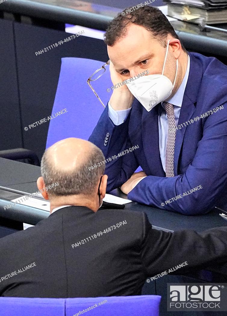 Stock Photo: 18 November 2021, Berlin: Olaf Scholz (below, SPD), Executive Federal Minister of Finance, in conversation with Jens Spahn (CDU).