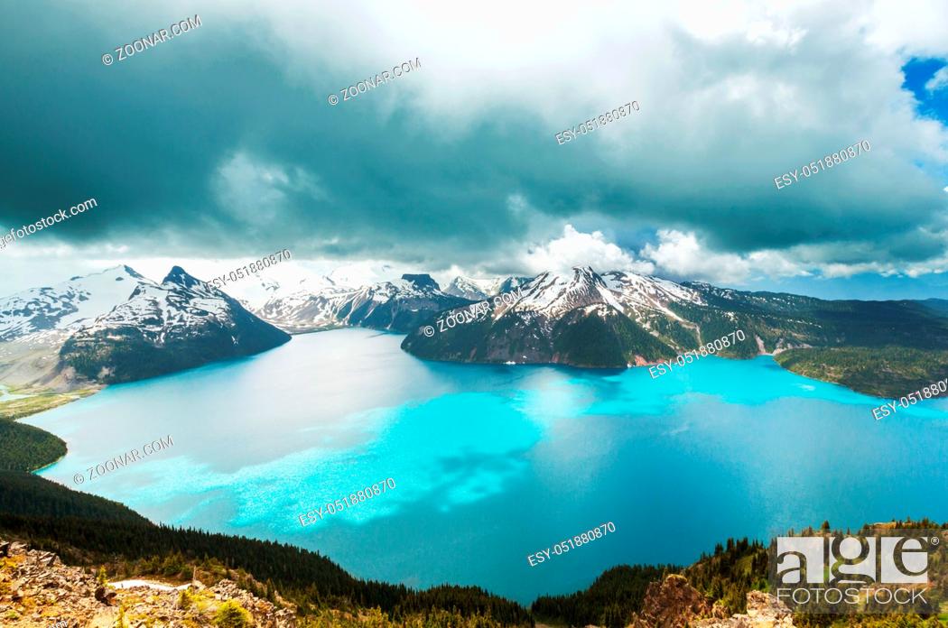 Stock Photo: Hike to turquoise waters of picturesque Garibaldi Lake near Whistler, BC, Canada. Very popular hike destination in British Columbia.