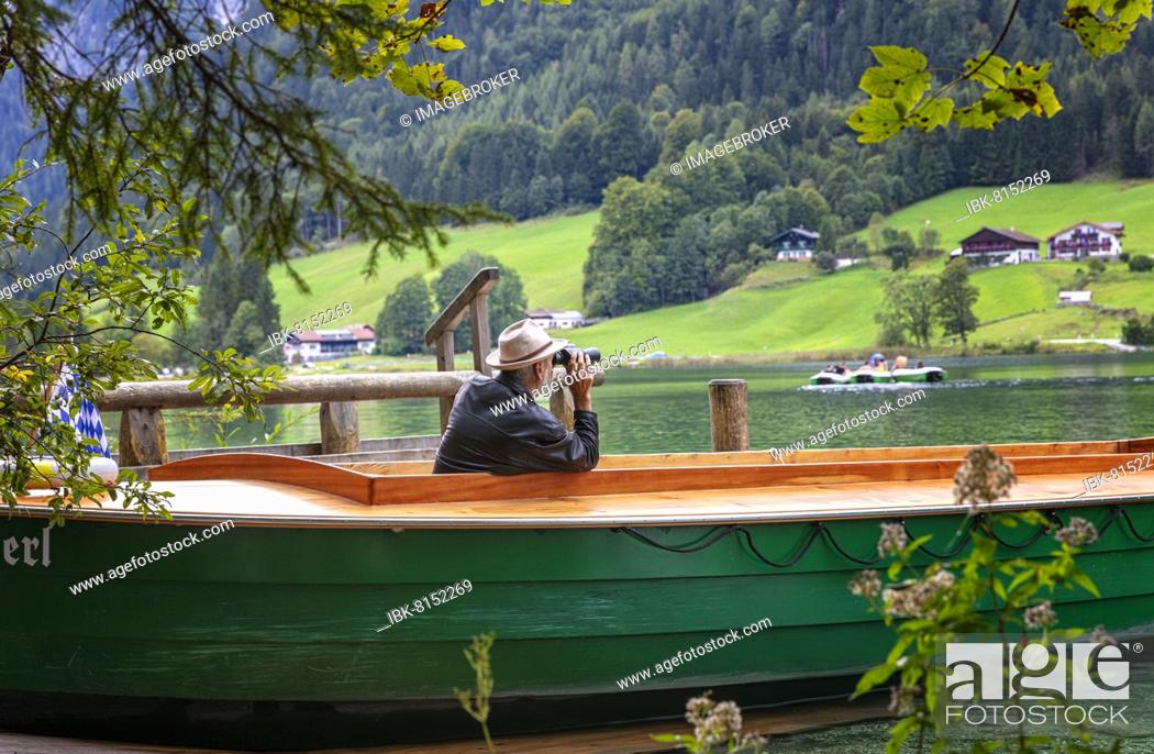 Stock Photo: Ferryman of the Annerl ferry station at Hintersee keeps an eye out for passengers, Ramsau bei Berchtesgaden, Bavaria, Germany, Europe.