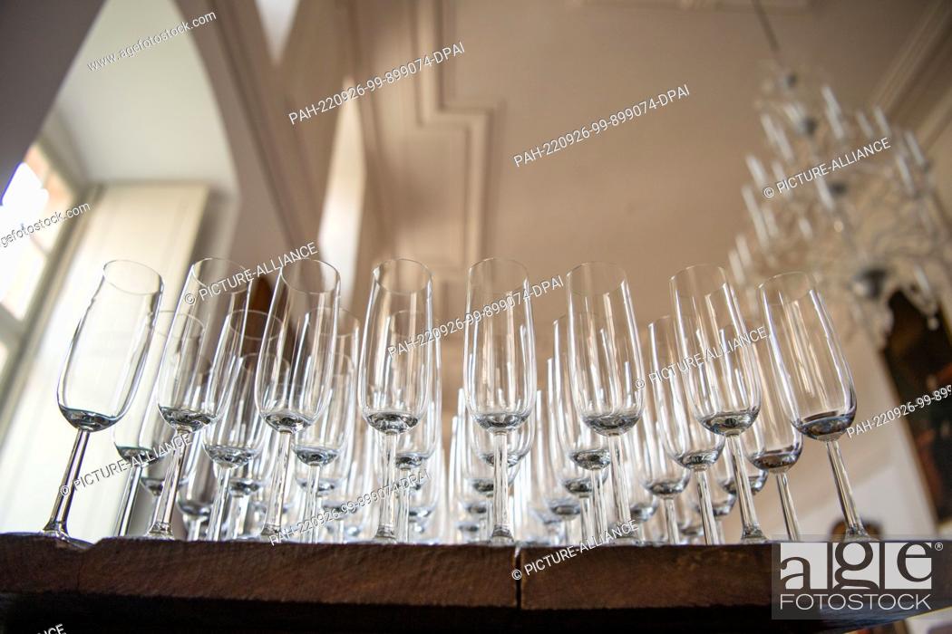 Stock Photo: 25 September 2022, North Rhine-Westphalia, Höxter: Champagne glasses stand orderly on a table. Photo: Lino Mirgeler/dpa. - Höxter/North Rhine-Westphalia/Germany.
