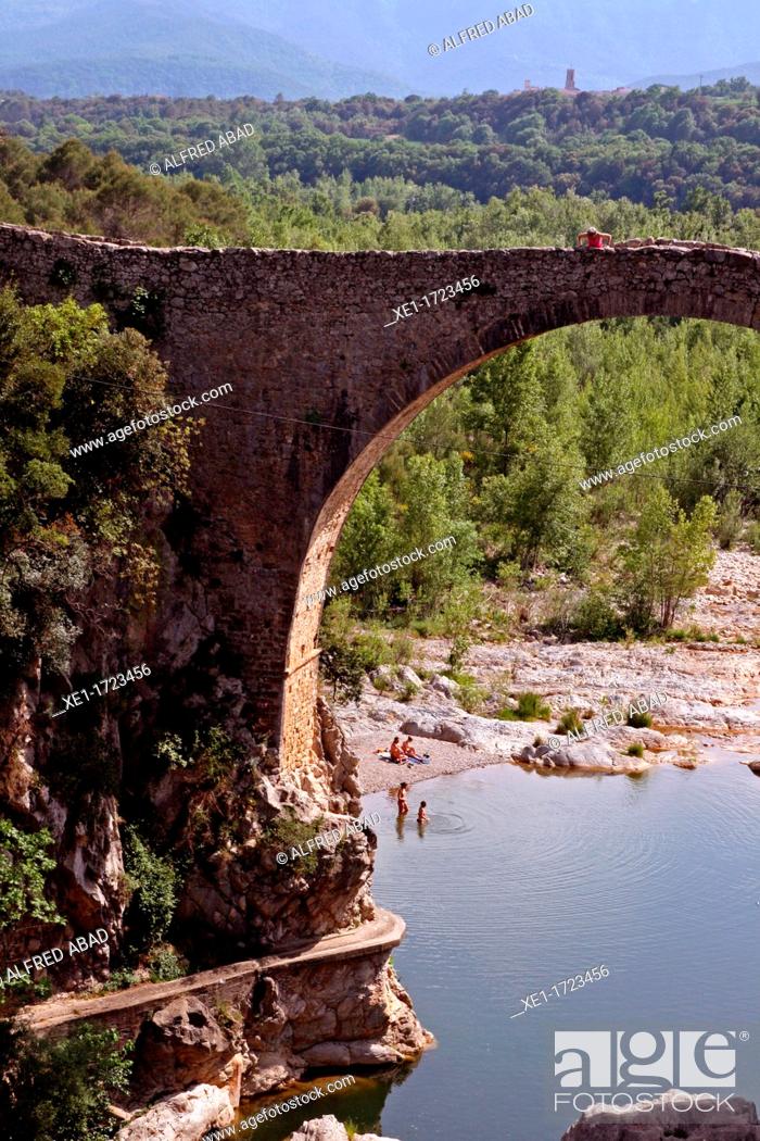 Stock Photo: Romanesque bridge, river Llierca, Alta Garrotxa, Catalonia, Spain.