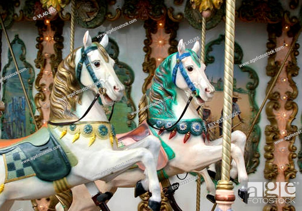 Stock Photo: Two horses carousel child closeup, Montreux, Switzerland.
