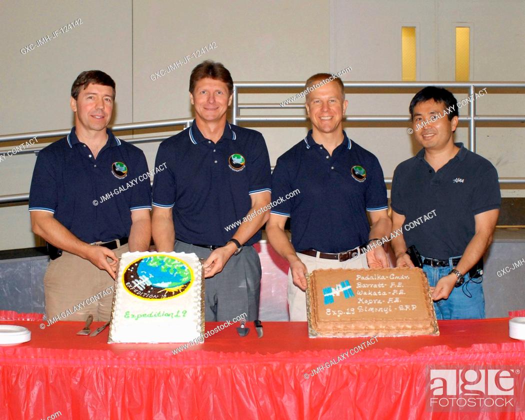 Stock Photo: Expedition 19 crewmembers celebrate the end of formal crew training with a cake-cutting ceremony in the Jake Garn Simulation and Training Facility at NASA's.