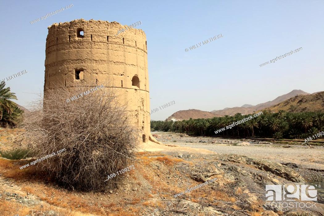 Stock Photo: traditional old watchtower in wadi of Old Fanja, Hajar al Gharbi , Sultanate of Oman, Asia.