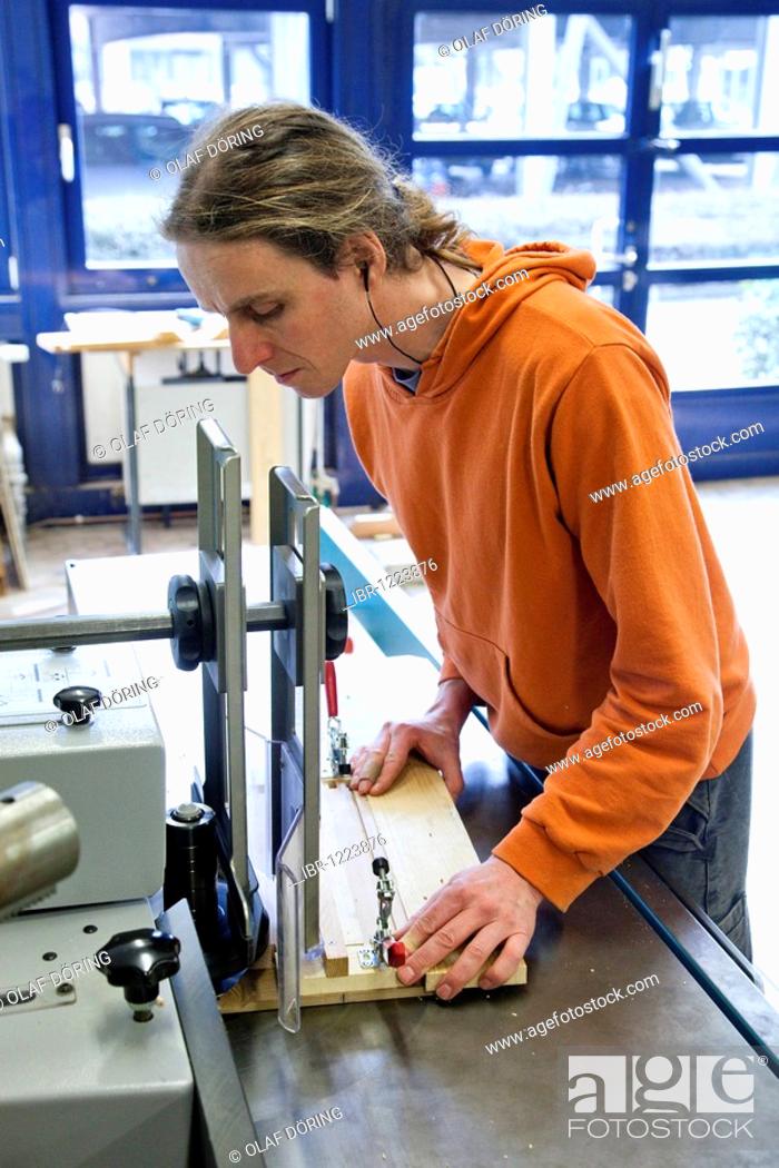 Stock Photo: Master carpenter apprentice using a milling machine, Master Craftman School of the Chamber of Small Industries and Skilled Trades for carpentry, Dusseldorf.