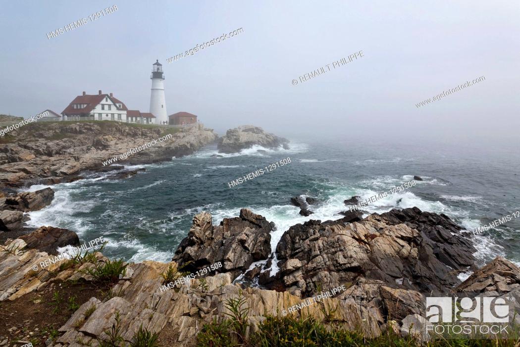 Stock Photo: United States, Maine, Portland, Cape Elizabeth, Portland Head Light in the fog.