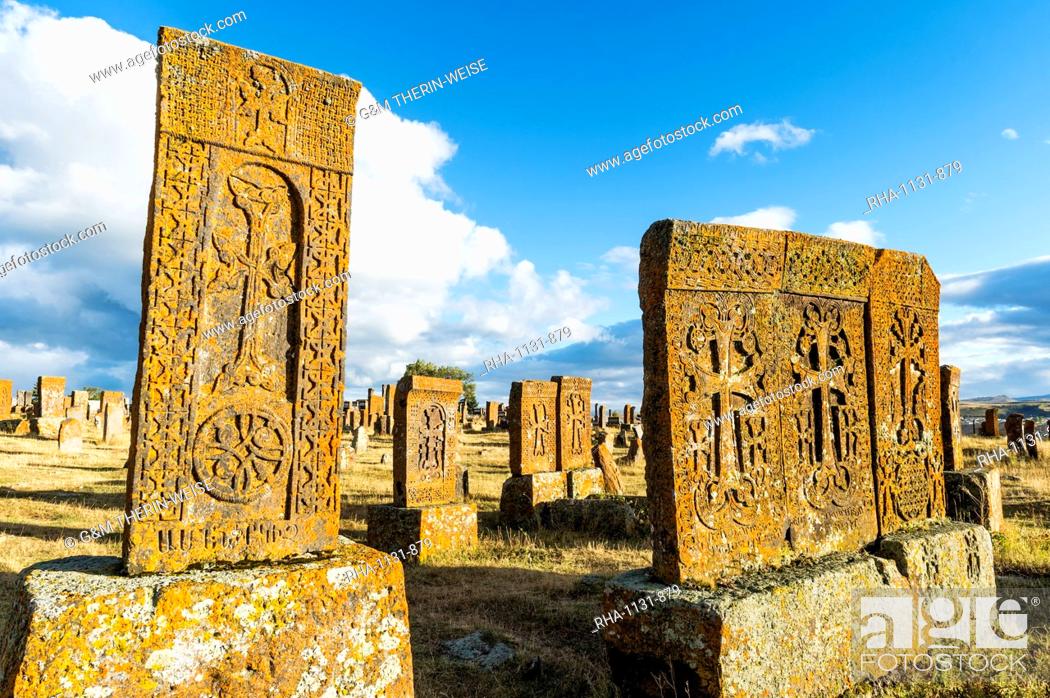 Photo de stock: Medieval Khachkars carved memorial stele, Noratus cemetery, Sevan Lake, Gegharkunik province, Armenia, Caucasus, Asia.
