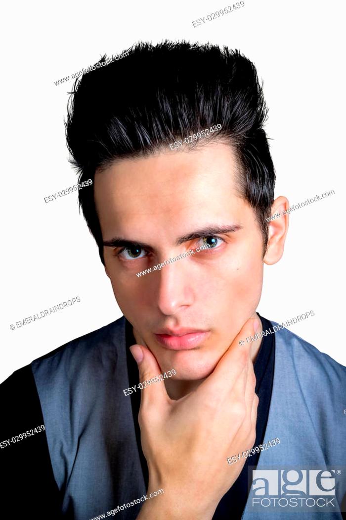 Stock Photo: Cute Dark Hair Green Eye Male With Hand On Chin.
