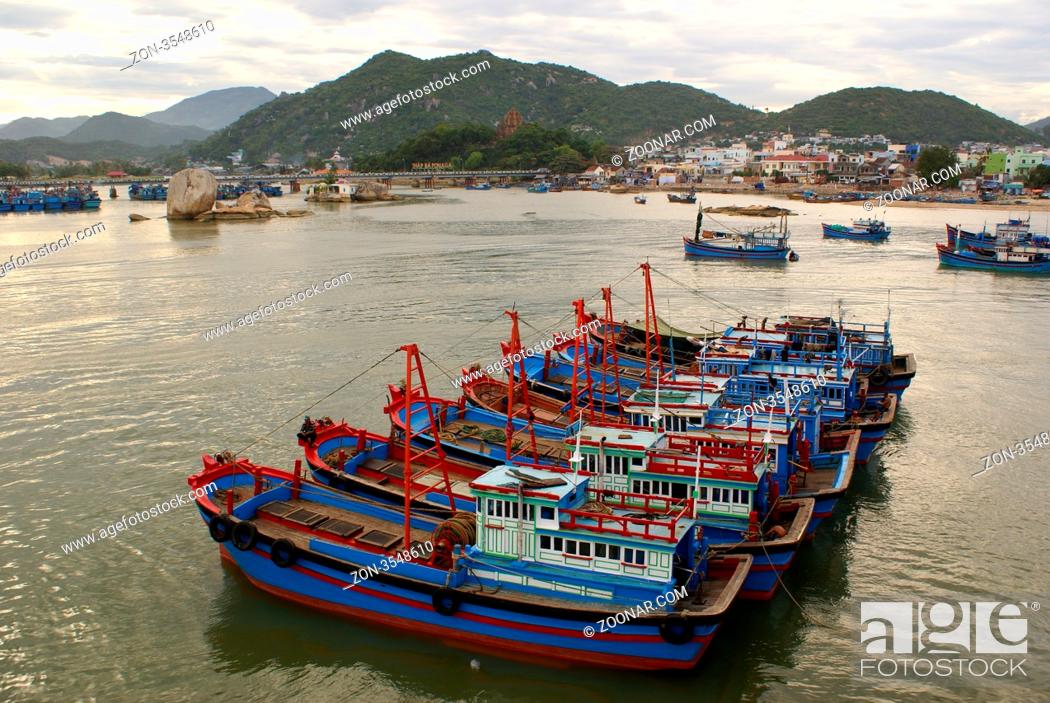 Stock Photo: Boats in tha bay in Nha Trang, Vietnam.