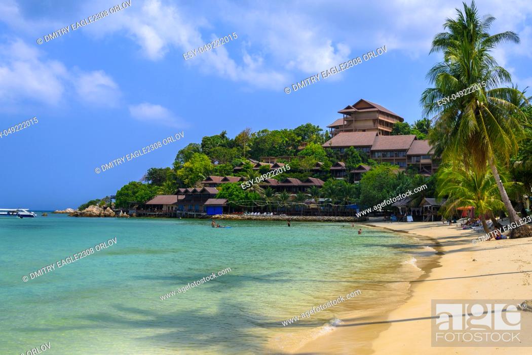 Stock Photo: Coconut palms and bungalows, Haad Yao beach, Koh Phangan island, Suratthani, Thailand.