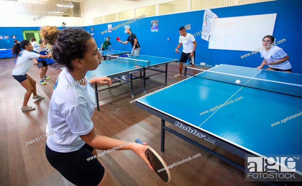 Stock Photo: Students of Brazil's first sports high school, Ginasio Experimental Olimpico (GEO), practice table tannis in Rio de Janeiro, Brazil, 8 August 2014.