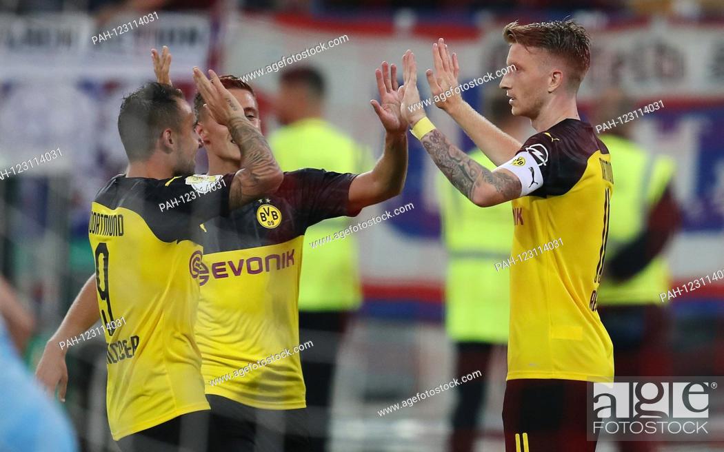 Stock Photo: firo: 09.08.2019 Football, 2019/2020 DFB Pokal 1st round KFC Uerdingen Krefeld - BVB Borussia Dortmund TOR jubilation TO 1: 0 BY MARCO REUS with Paco Alcacer |.