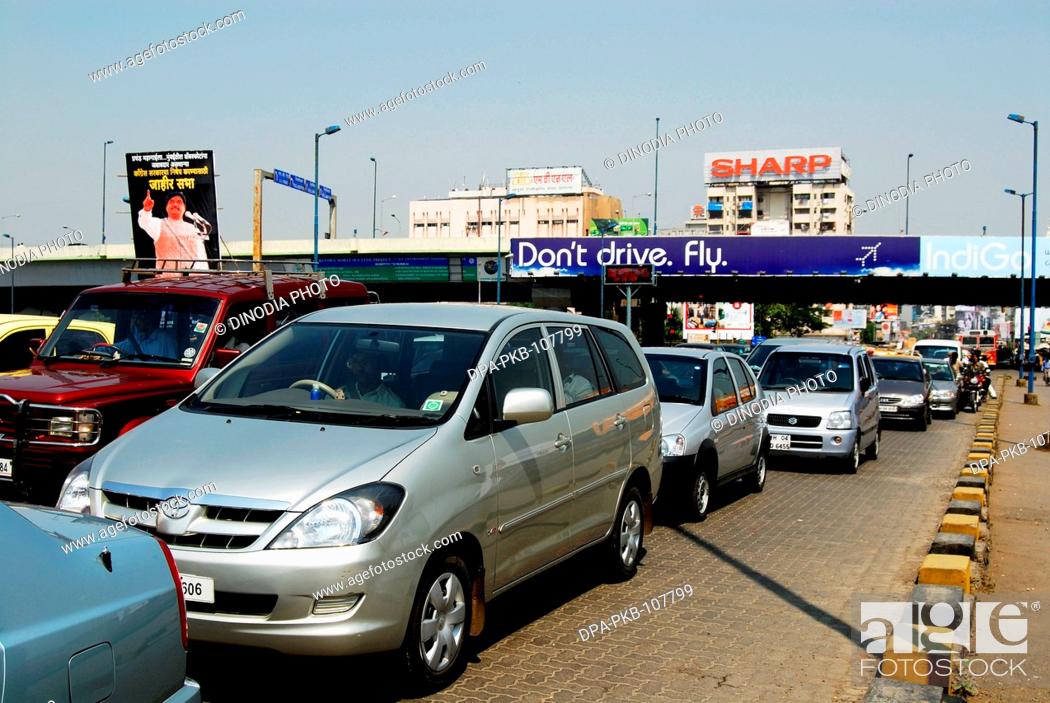 Traffic Jam in Bombay Street and Funny Ad on the Top to Solve Problem  Stating Do Not Drive but Fly..., Stock Photo, Picture And Rights Managed  Image. Pic. DPA-PKB-107799 | agefotostock