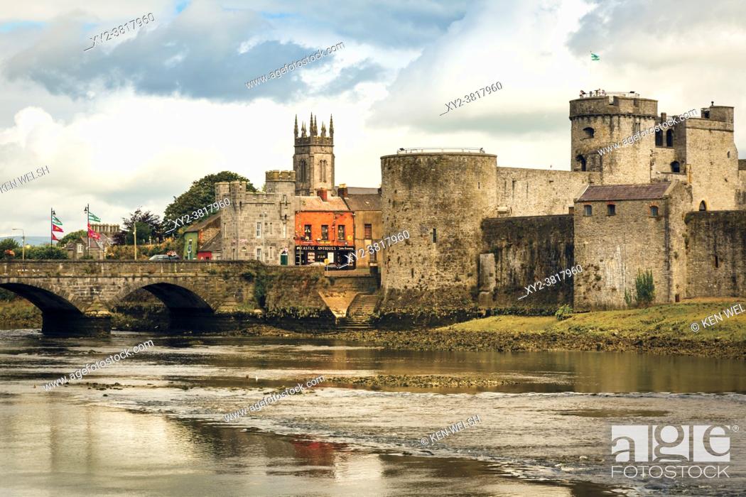 Stock Photo: Limerick, County Limerick, Republic of Ireland. Eire. King John's Castle beside the River Shannon. The castle was built in the 13th century and is amongst the.