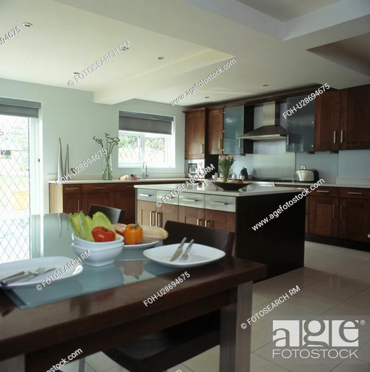 White Crockery On Table In Modern Kitchen With Dark Wood Island Unit 13 10 13 10 Stock Photo Picture And Rights Managed Image Pic Foh U28694675 Agefotostock