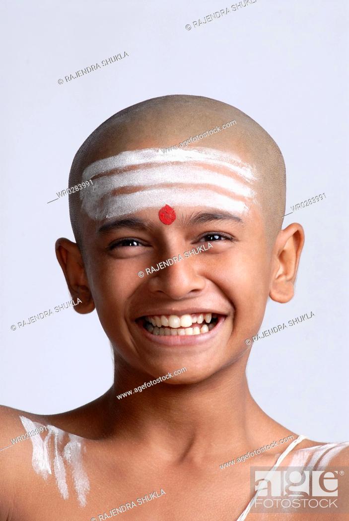 Portrait of South Asian Indian bald boy red tilak on forehead MR719, Stock  Photo, Picture And Royalty Free Image. Pic. WR0283991 | agefotostock