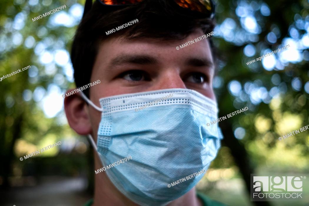 Stock Photo: Portrait of a man wearing a protective mask against Covid-19. France.