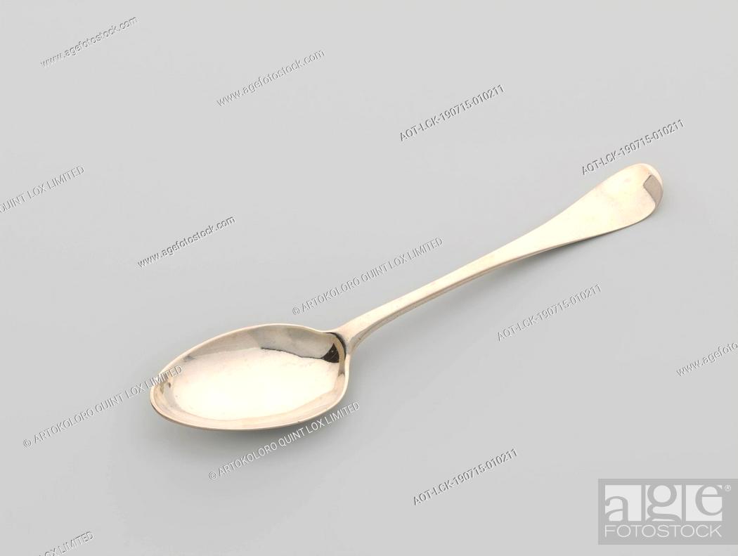 Stock Photo: Dessert spoon with the Clifford helmet sign, The egg-shaped bowl is connected to the flat, curved handle by means of some praise.