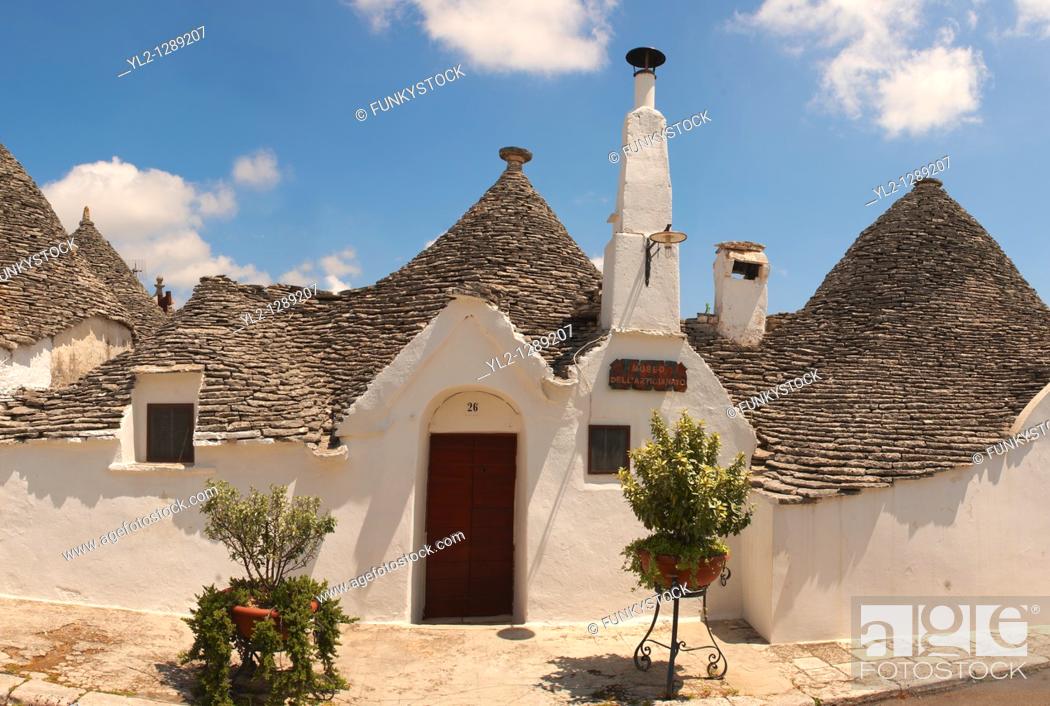 Stock Photo: Stone Trulo house with beehive shaped conical roof, traditional Turlli houses of Alberobello, Apulia, Italy.