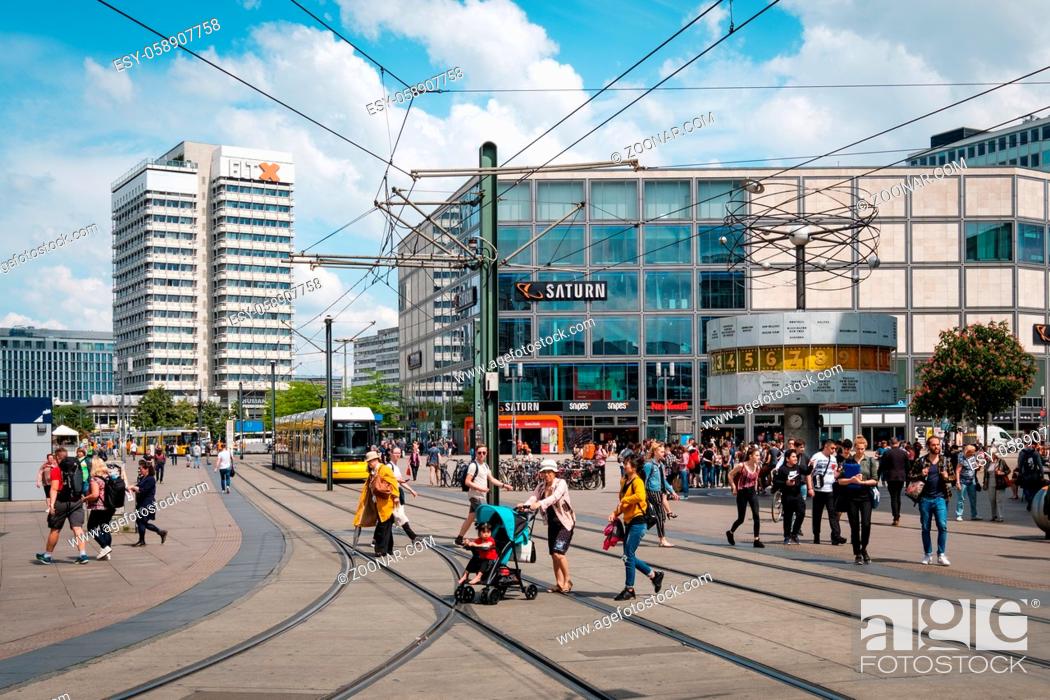 Stock Photo: Berlin, Germany - May, 2019: People on crowded street at Alexanderplatz square in Berlin city Center.