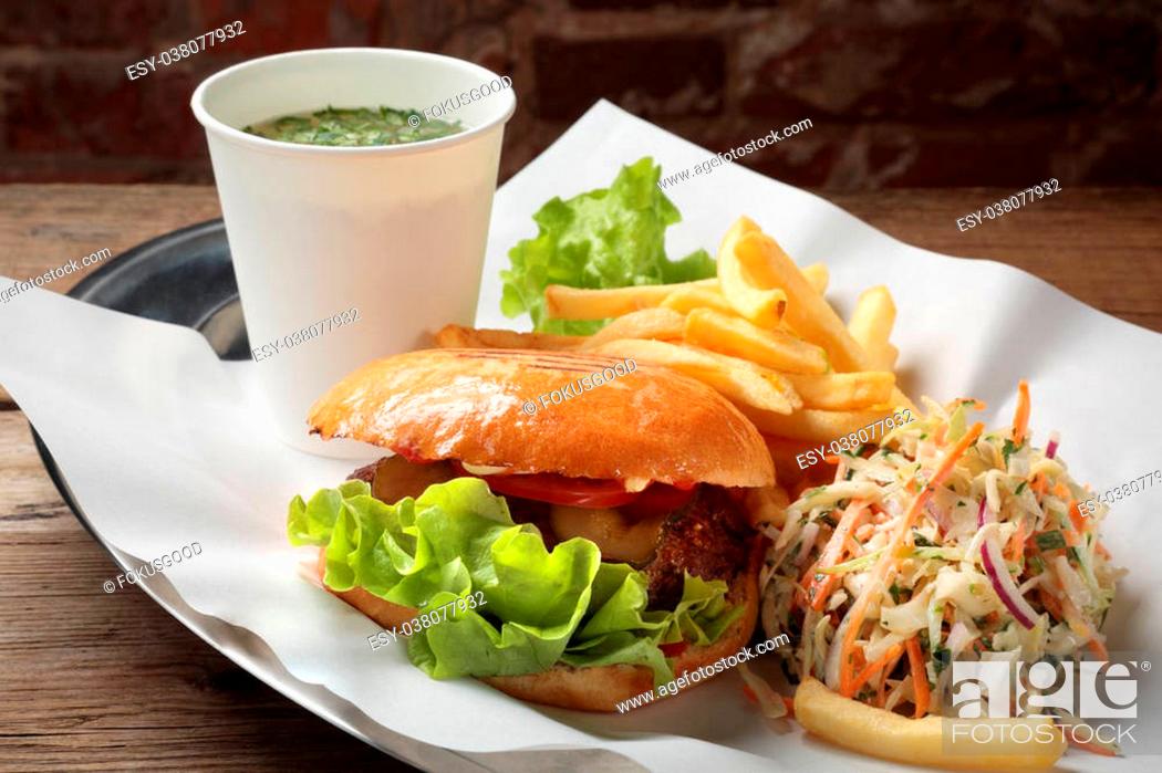 Stock Photo: The food with soup, burger and salad on a tray with white paper.