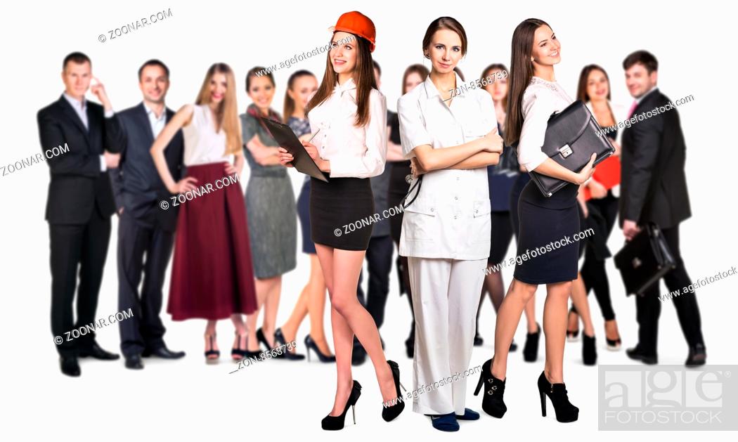 Stock Photo: Successful business women of different professions with people crowd background. Isolated on white.