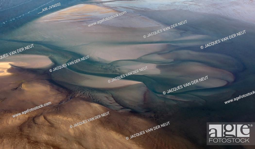 Stock Photo: Mudflats in the Wadden Sea near Texel, Netherlands, seen from the air.