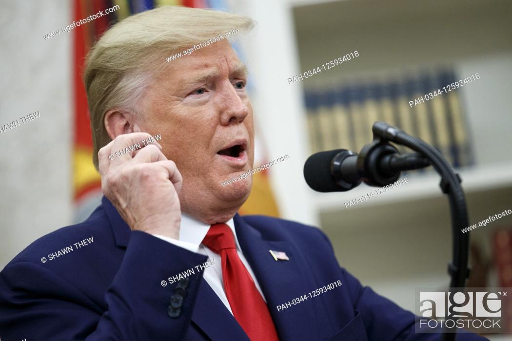 Stock Photo: US President Donald J. Trump delivers remarks during a Presidential Medal of Freedom ceremony for American racing magnate Roger Penske in the Oval Office of the.
