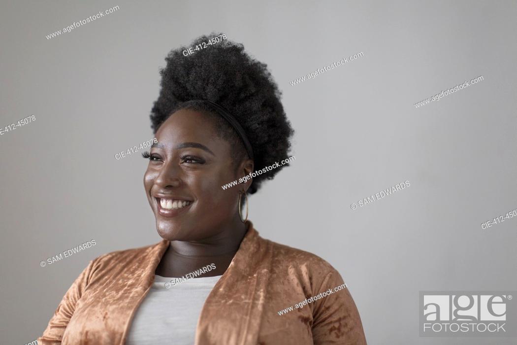 Stock Photo: Portrait smiling, confident woman looking away.