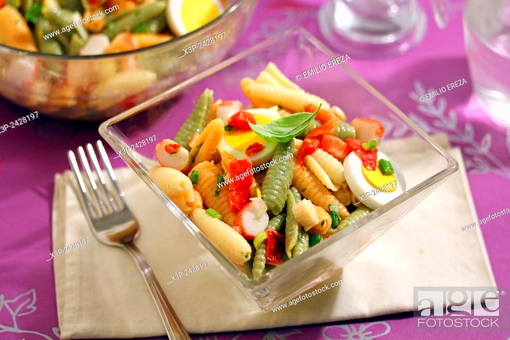 Stock Photo: Pasta. Shells salad with basil.