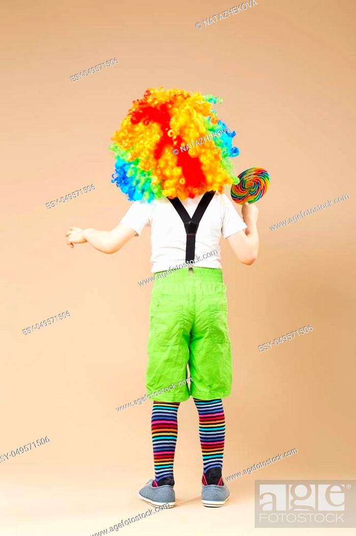 Happy clown boy in large colorful wig. Let's party! Funny kid clown, Stock  Photo, Picture And Low Budget Royalty Free Image. Pic. ESY-049571506 |  agefotostock