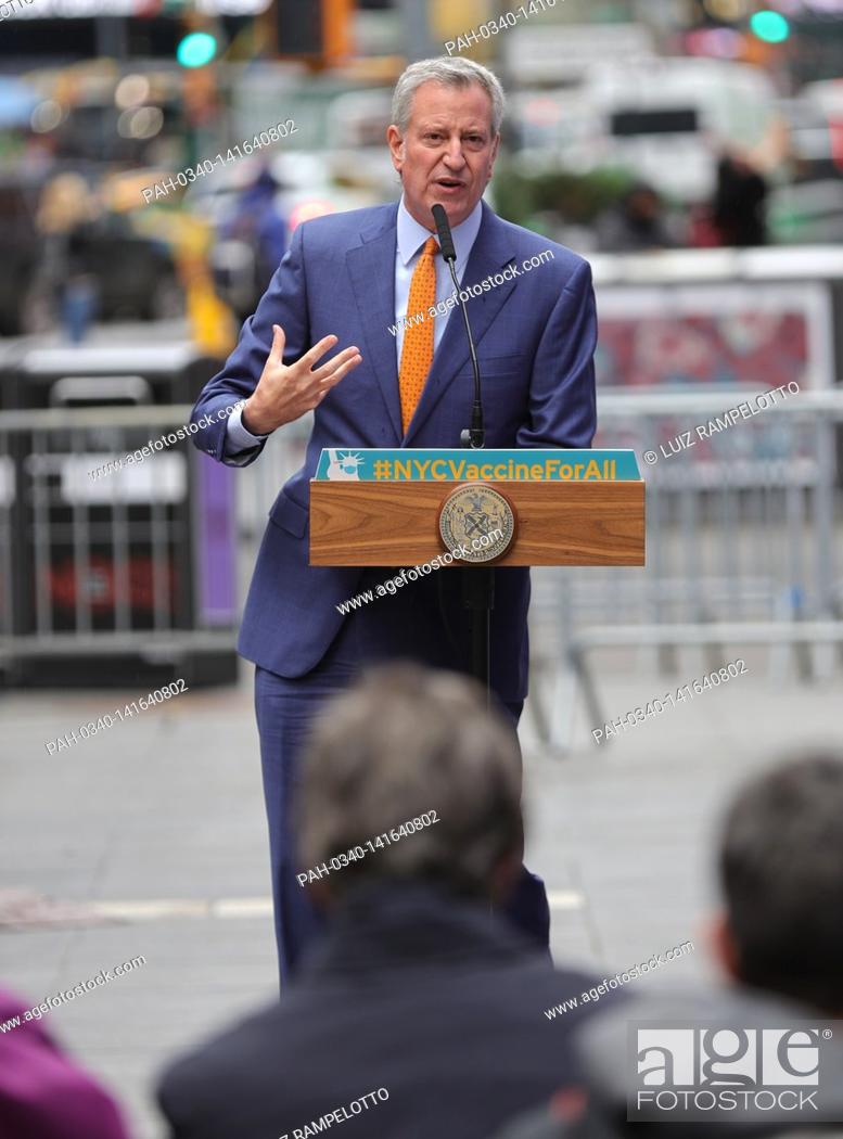 Stock Photo: Time Square, New York, USA, April 12, 2021 - Mayor Bill de Blasio presser after a tour of the first Broadway vaccination site and enjoy a live performance in.