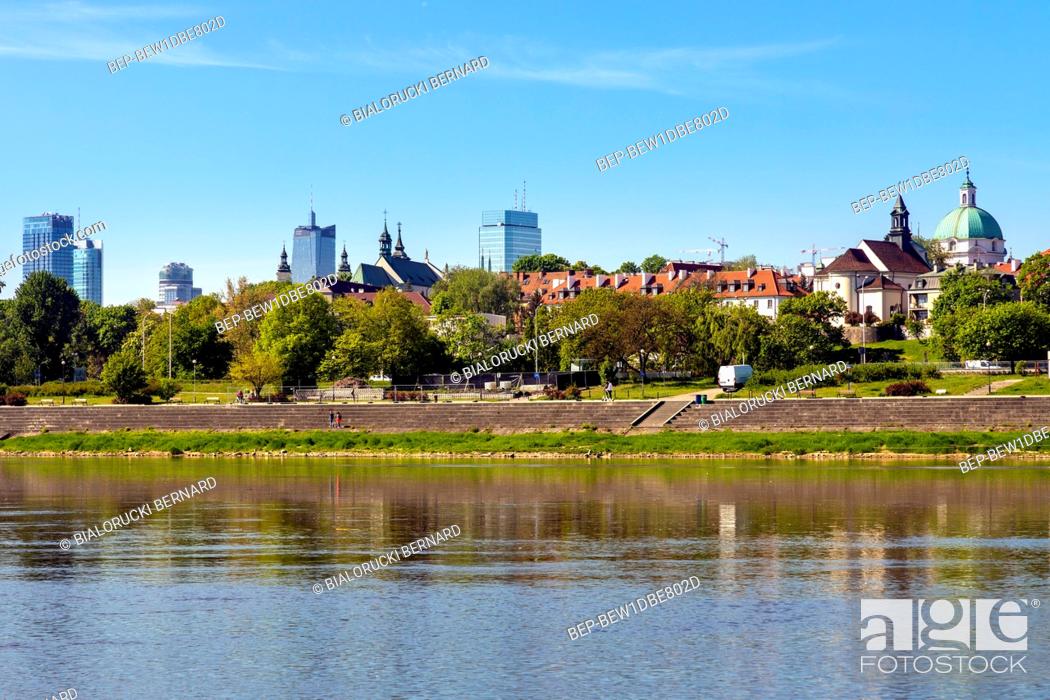 Stock Photo: Warsaw, Mazovia / Poland - 2020/05/09: Panoramic view of Warsaw city center and Old Town quarter with Wybrzerze Gdanskie embankment at Vistula river.