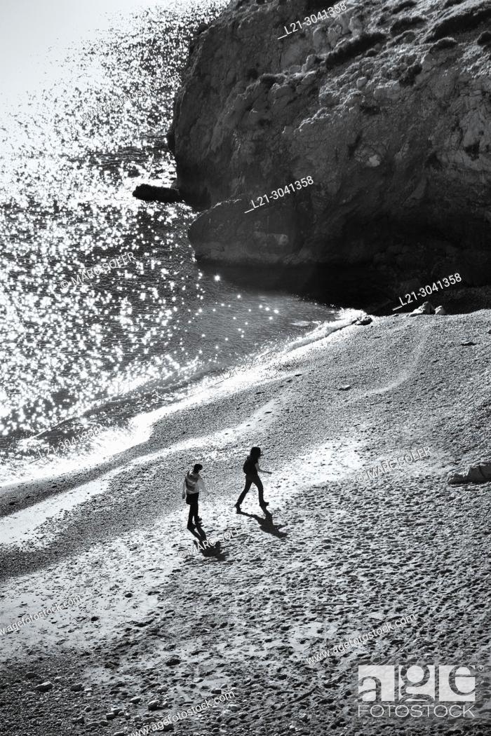 Stock Photo: Couple in a beach. Barcelona province, Catalonia, Spain.