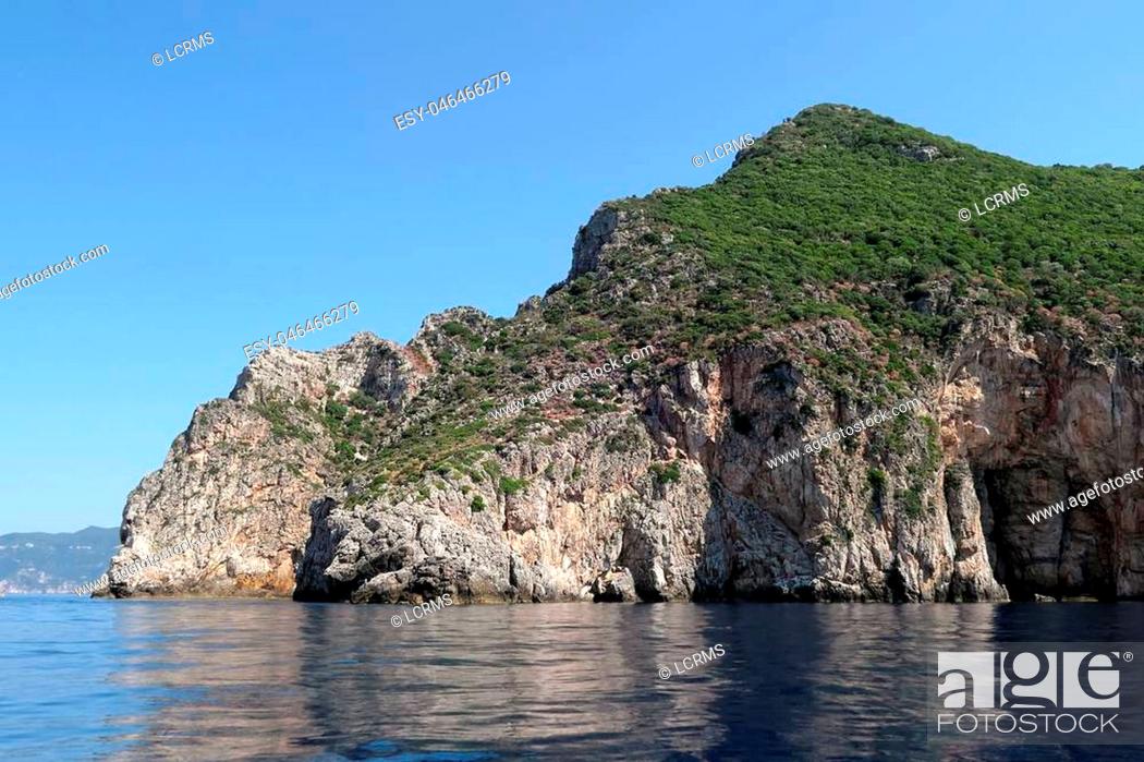 Stock Photo: rock formation at paradise beach of Liapades at Corfu Island (Greece). Sedimentary rock cliff of chalk rocks.