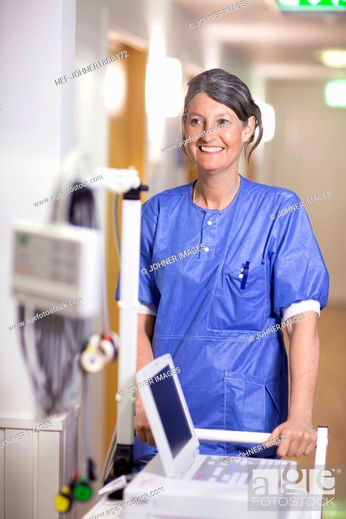 Stock Photo: Portrait of smiling mature nurse.