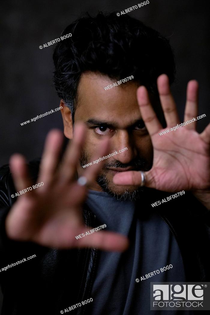 Stock Photo: Portrait of an Indian magician, gesturing.