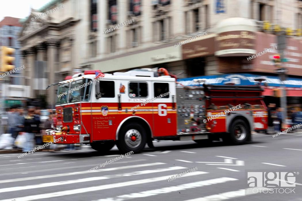 Stock Photo: United States, New York City, Manhattan, fire truck in action.