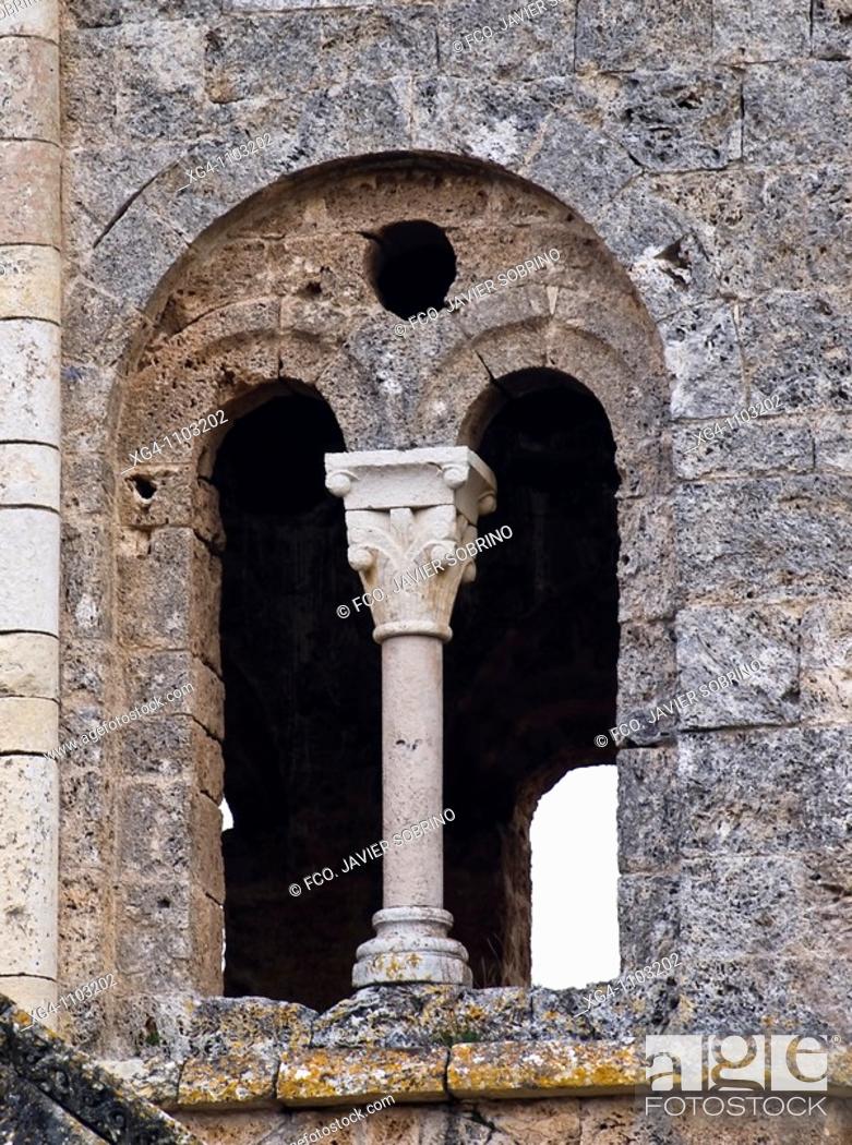 Stock Photo: Ventana geminada en la torre de la iglesia de estilo románico de San Pedro de Tejada - Valle de Valdivielso - Burgos - Castilla y León - España.