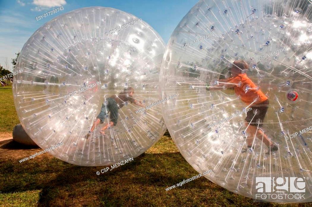 Stock Photo: child has a lot of fun in the Zorbing Ball.
