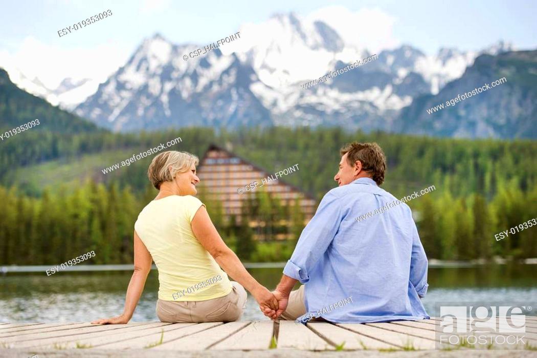 Stock Photo: Senior couple on pier.